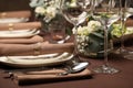 Stylish elegant table setting for festive dinner in restaurant Royalty Free Stock Photo