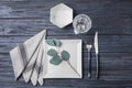 Stylish elegant table setting on wooden background Royalty Free Stock Photo