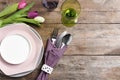 Stylish elegant table setting on wooden background, top view.