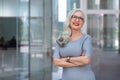 Stylish energetic and enthusiastic business woman CEO smiling with personality at office workplace Royalty Free Stock Photo