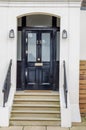 Stylish entrance to the building, a beautiful metal railings, or