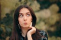 Stylish Fashion Girl with Plaid Shirt and Tassel Earrings Royalty Free Stock Photo