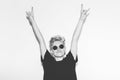 Stylish fashion blonde bad girl in a black t-shirt and rock sunglasses. Dangerous rocky emotional woman giving the Royalty Free Stock Photo