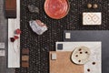 Stylish flat lay composition of architect moodboard with samples of building, brown textile and natural materials and personal.