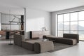 Stylish flat studio interior with luxury furniture and window. Mock up wall Royalty Free Stock Photo