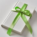 Stylish gift wrapping, green silk ribbon, special occasion present, elegant simplicity, copy space Royalty Free Stock Photo