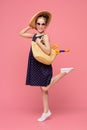 Stylish girl going to swim with snorkel in wicker bag Royalty Free Stock Photo