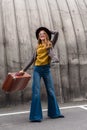 stylish girl in hat with suitcase Royalty Free Stock Photo