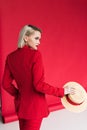 attractive stylish girl in red jacket with straw hat Royalty Free Stock Photo