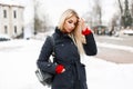 Stylish glamorous young model girl in a fashion winter coat