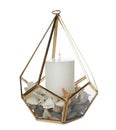 Stylish glass holder with burning candle, seashells and pebbles isolated on white Royalty Free Stock Photo