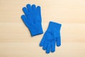 Stylish gloves on white wooden background, flat lay Royalty Free Stock Photo