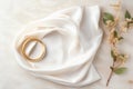 Stylish Golden Bijouterie on White Fabric Flat Lay AI Generated Royalty Free Stock Photo