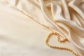 Stylish Golden Bijouterie on White Fabric: A Flat Lay with Space for Text AI Generated Royalty Free Stock Photo