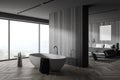 Stylish gray and wooden bathroom and bedroom corner Royalty Free Stock Photo