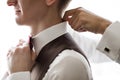 stylish groom laughing and having fun with groomsmen while getti Royalty Free Stock Photo