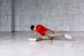 Stylish guy dancing break dance on floor. Royalty Free Stock Photo