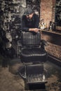 Portrait of stylish hairdresser man in his studio Royalty Free Stock Photo