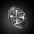 Stylish hand watch. Chrome on a black background Royalty Free Stock Photo