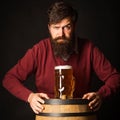 Stylish handsome man drinking beer over Black background. Brewer. Emotional funny bearded drunk hipster holds craft