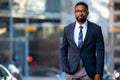 Stylish handsome modern business executive, african american banker, financial representative, suit and tie with smart glasses Royalty Free Stock Photo