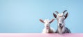 Stylish happy goats on pastel background with space for adding text, quotes, or captions