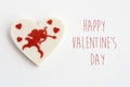 stylish heart candy with cupid on white background, happy valentines day text, greeting card concept