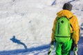 Stylish hiker girl climbing snow trail among dazzler ice floes of Perito Moreno glacier and having fun with her shade. Royalty Free Stock Photo