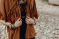 Stylish hipster boho traveler woman look. gypsy girl in fringe j Royalty Free Stock Photo