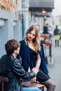 Stylish hipster couple in cafe outdoor. portrait of couple in city Royalty Free Stock Photo
