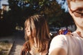 Stylish hipster couple making selfie and embracing in sunlight. Happy family couple in love making self portrait and posing in Royalty Free Stock Photo