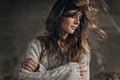 stylish hipster gypsy woman posing in knitted sweater. atmospheric windy sensual moment. boho country fashionable look. free Royalty Free Stock Photo