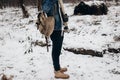 Stylish hipster traveler with backpack walking in nubuk shoes in