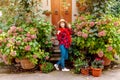 Hipster traveller woman posing in old town of Pienza, Tuscany