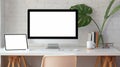 Stylish home office with blank screen desktop computer Royalty Free Stock Photo