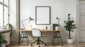Stylish home office with an empty Picture frame above desk, AI-generated. Royalty Free Stock Photo