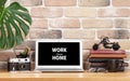 Stylish home studio workspace with laptop and supplies Royalty Free Stock Photo