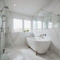 Stylish interior of bathroom with bathtub shower towels and other personal bathroom accessories Modern and design interior Mar Royalty Free Stock Photo