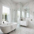 Stylish interior of bathroom with bathtub shower towels and other personal bathroom accessories Modern and design interior Mar Royalty Free Stock Photo