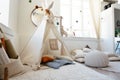 Stylish interior of children& x27;s room with hut Royalty Free Stock Photo