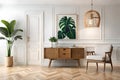 Stylish interior design of living room with wooden retro commode, chair, tropical plant in rattan.