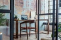 Industrial style home office with impressive wooden oak desk.