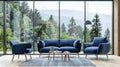 Elegant blue sofa and chair in a modern living room with breathtaking forest view Royalty Free Stock Photo