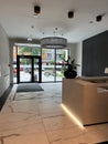 Stylish interior of hotel hallway with reception desk