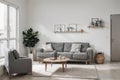 Stylish interior living room with comfortable gray color real photo modern sofa tv carbinet dinning table Royalty Free Stock Photo