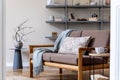 Interior design and home decor of living room with brown wooden sofa. Royalty Free Stock Photo