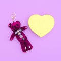 Stylish keychain teddy bear. Fashion gift concept