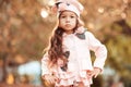 Stylish kid girl posing in winter jacket Royalty Free Stock Photo