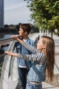 stylish kids in denim vests standing