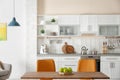 Stylish kitchen interior with dining table Royalty Free Stock Photo